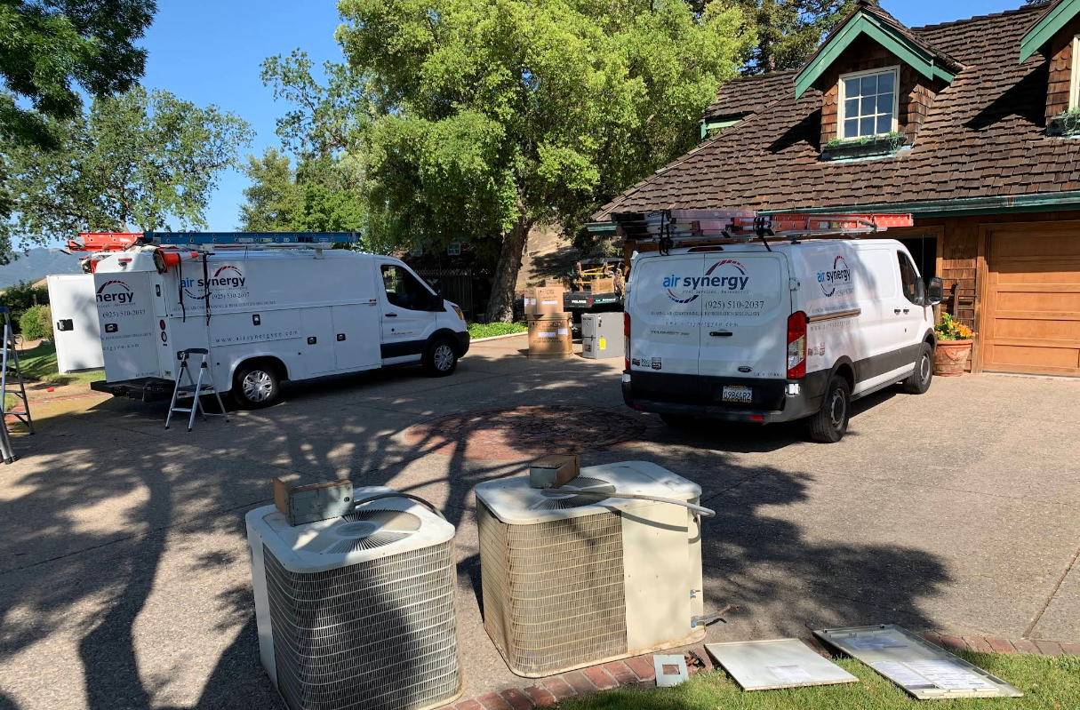 Air Synergy service vans on location