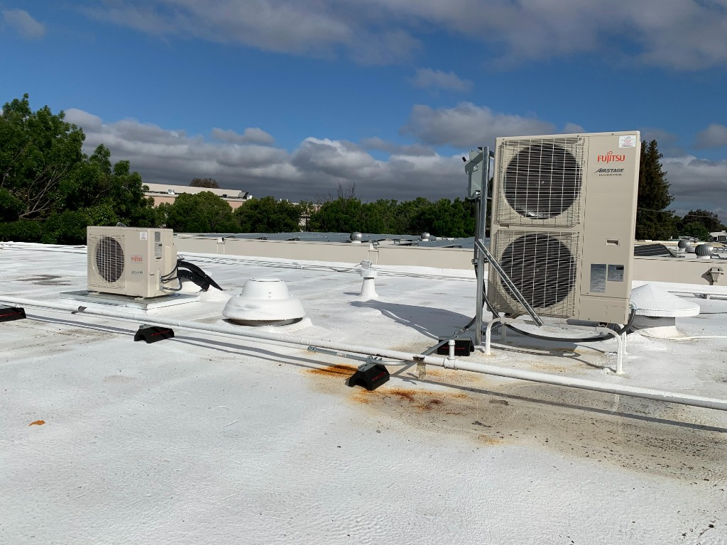 Fujitsu Airstage inverter-driven commercial HVAC system installed by Air Synergy on a Bay Area commercial rooftop