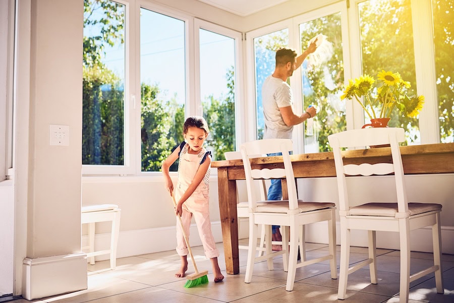 Shot of a father and his little daughter doing chores together at home.|ceiling mold